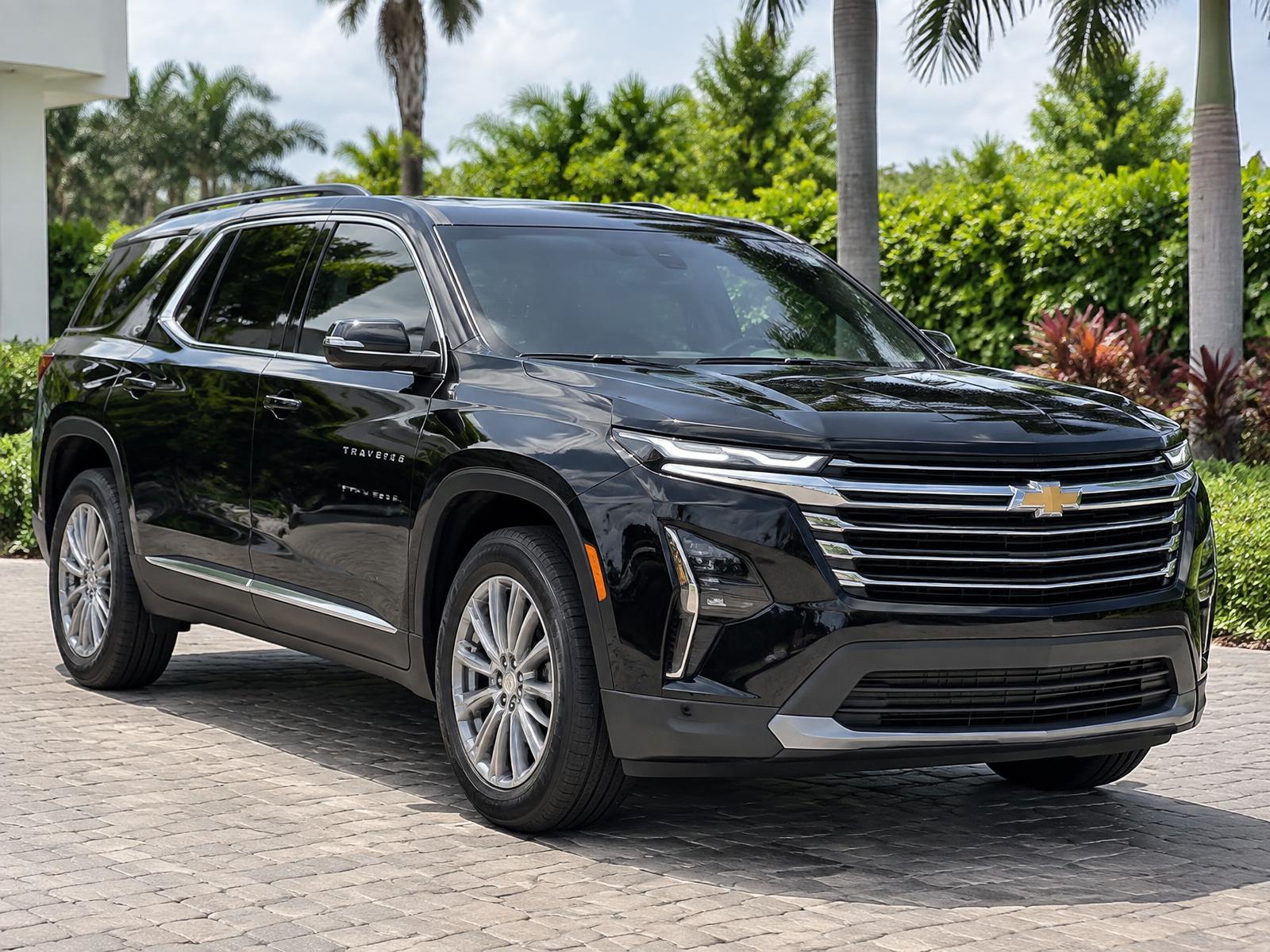 Black Chevrolet Traverse on a Guanacaste coastal road